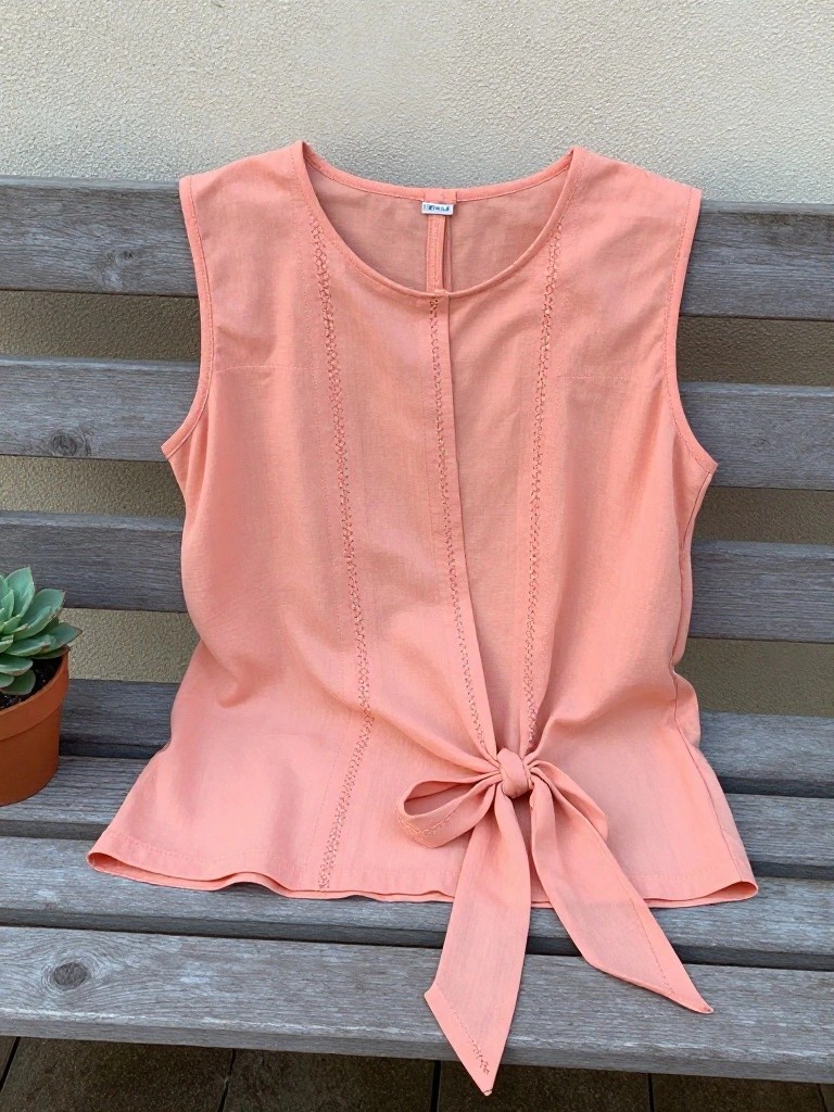 Sleeveless Top With Vertical Openwork And Tie Hem